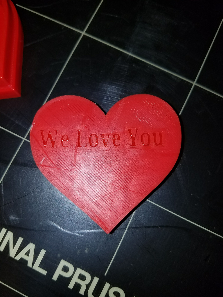 View of the custom text on heart box